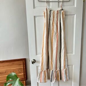 White and multi-coloured striped maxi dress

Size small by O-Neil